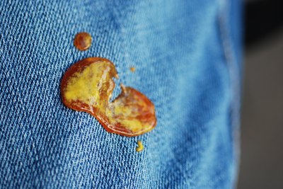 The enzymes in tide will remove stains.