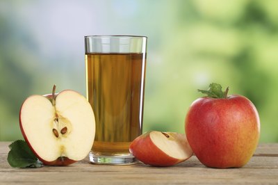 A glass of apple juice.