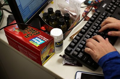 Bottle of Advil on workdesk