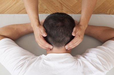 Man receives neck massage