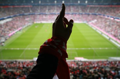 Hands in air at sporting event