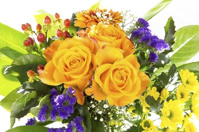 Statice holds its own in colorful arrangements with multiple fillers.