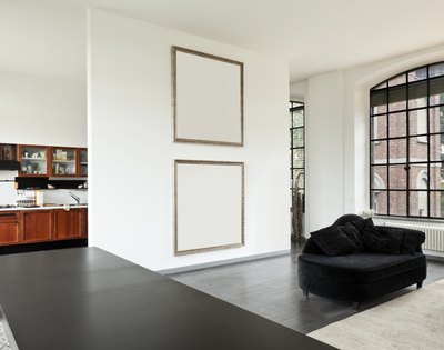 Framed pictures on wall.