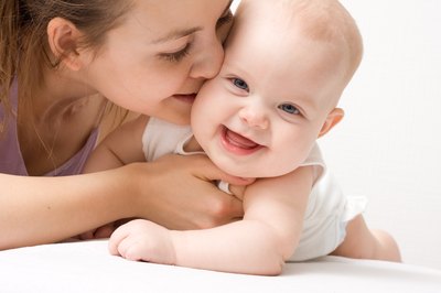 Before the baby is sitting up well on his own, and is able to hold his head up, you should not feed him cereal in a bottle or even on a spoon.