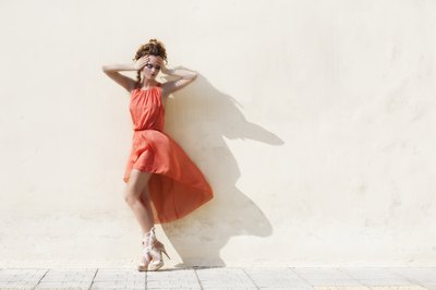 Thin woman in a dress.