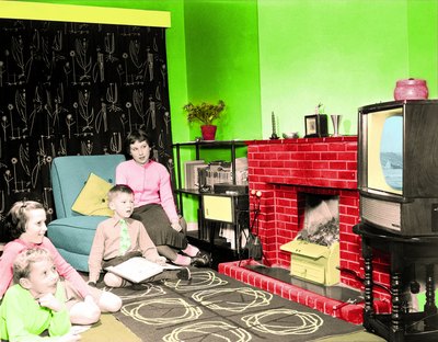 A family watches color television