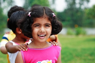 Three year old girl smiling