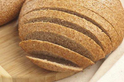 Sliced rye bread on a cutting board