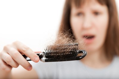 Hair loss on brush.