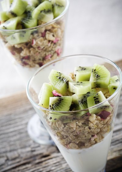 Bowls of granola, fruit and yogurt