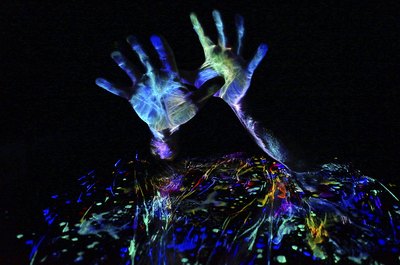 You can also use UV-reactive body paint to light up your clothes in the dark.
