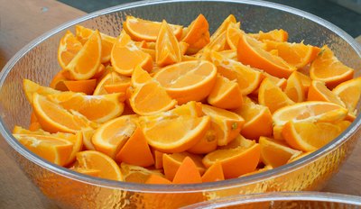 Large bowl filled with orange slices.
