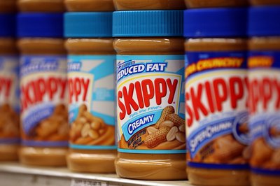 Peanut butter on the shelf, ready to be sold