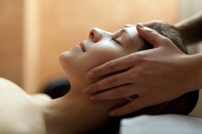 Woman getting massage at spa