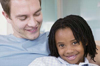 Adopted child and father.