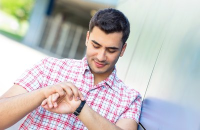 Man looking at watch