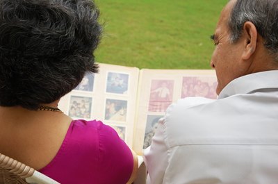Couple looking at photo album