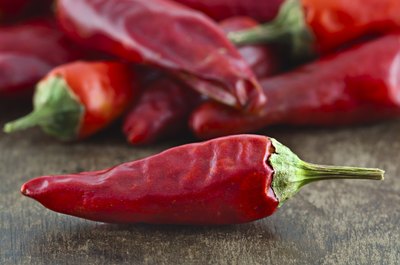 Start picking the peppers as the tips change from green to orange/red.