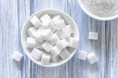 A small bowl of sugar cubes.