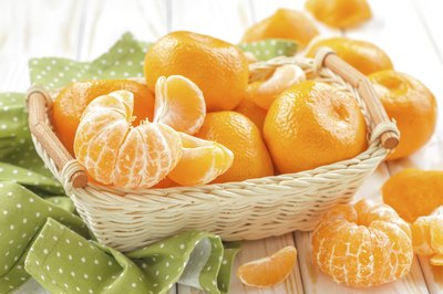A small basket of tangerines.