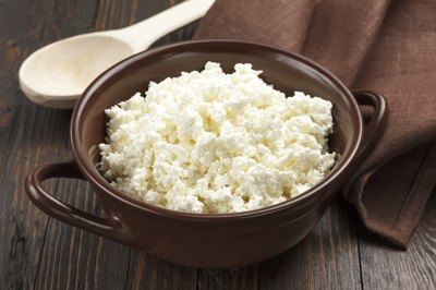 Cottage cheese in a brown bowl