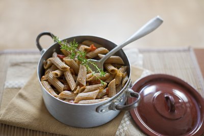 Pot filled with whole wheat pasta.