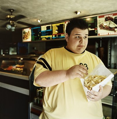 Man eating french fries