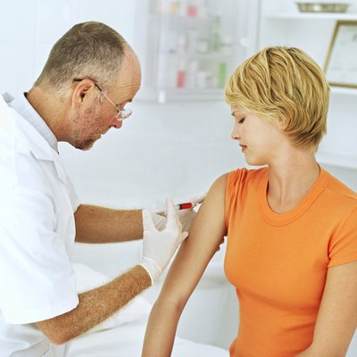 A woman gets her blood drawn.