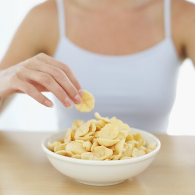 Avoid eating salty foods such as pretzels and chips because they promote water retention