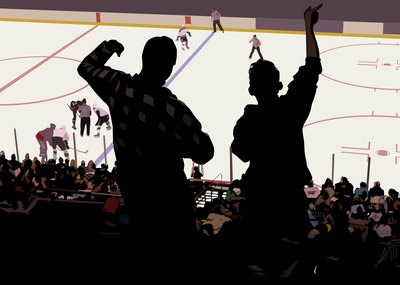 Hockey fans cheering at game