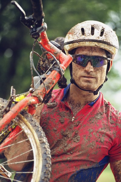 Man carrying bike
