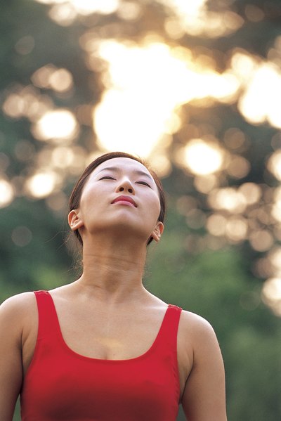 A woman praciticing breathing techniques