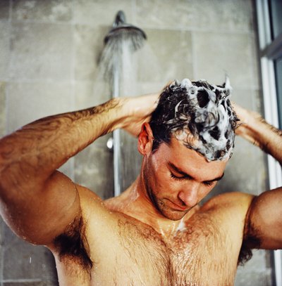Man using shampoo