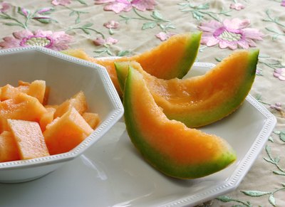 Canteloupe wedges on a dish.