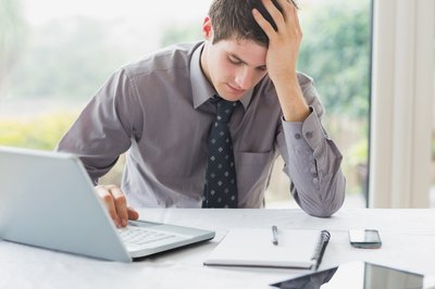 Man under stress at work