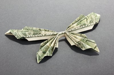 Origami butterfly made from money