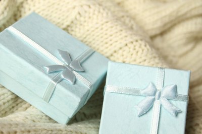 Turquoise boxes with jewelry inside.