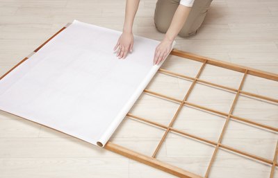 Woman making a shoji screen