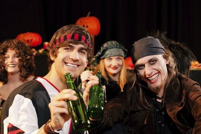 A group of friends enjoy a Halloween party.