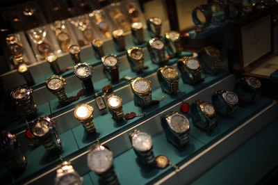 Rows of gold watches