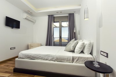 Sleep with a wedge or have enough pillows to elevate you.