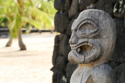 A wooden statue of a Tiki god in Hawaii.