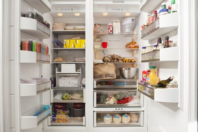 Open refrigerator and freezer.