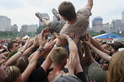 Crowd surfer at concert