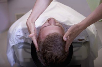 Patient lying on back before PET scan