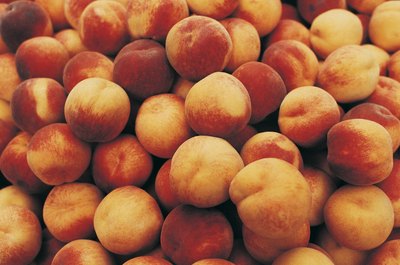 peaches for sale at a market.