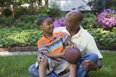 Boy laughing with Grandpa