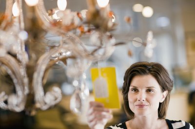 Woman shopping for a chandelier