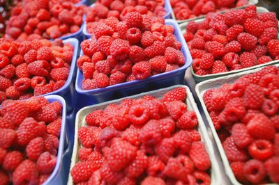 Cartons filled with raspberries.