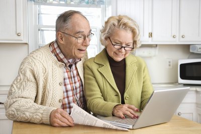 Senior couple on computer